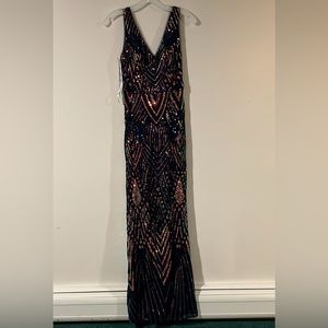 NWT! Never been worn! Stunning floor length gown.